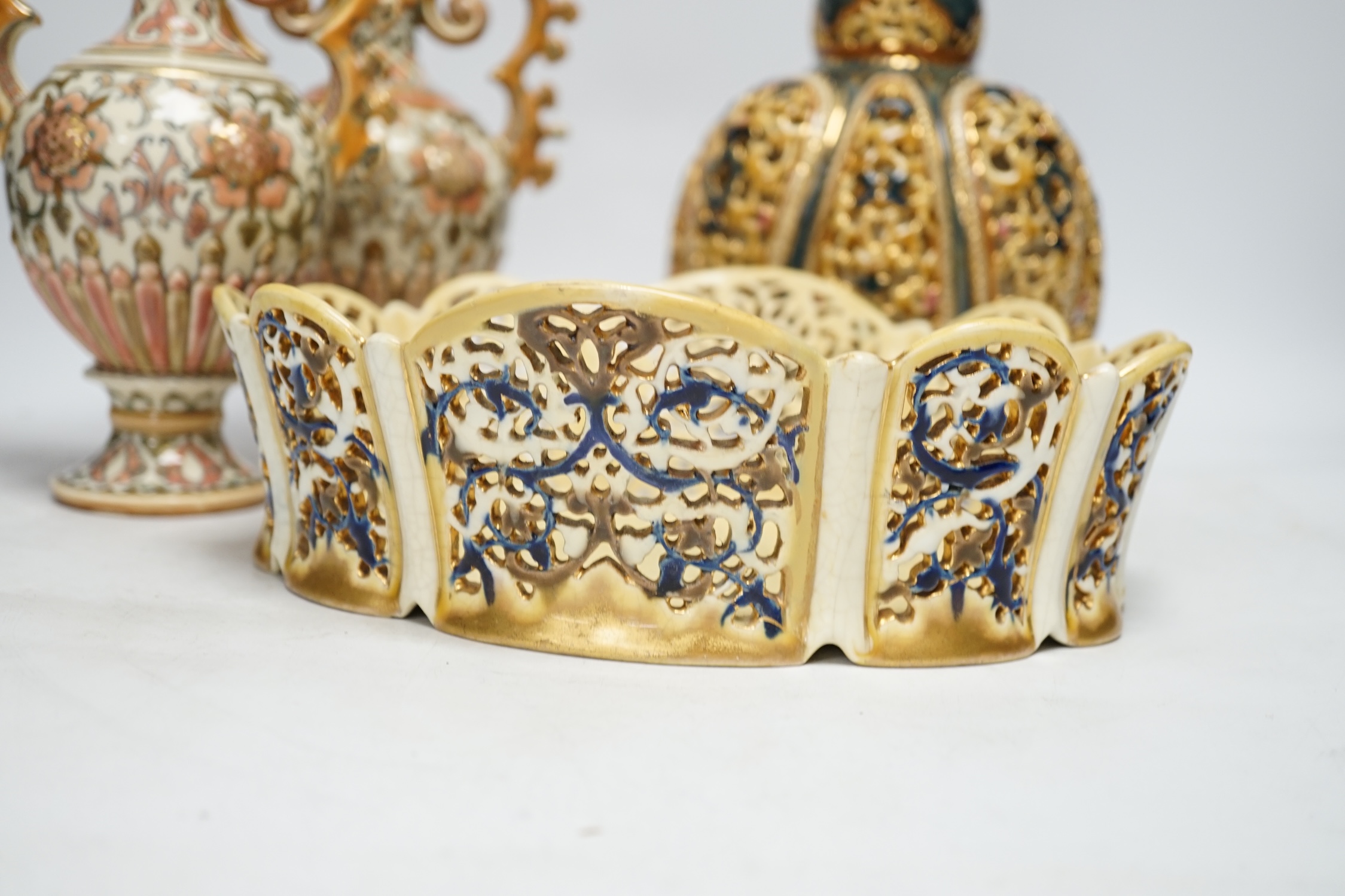 Hungarian pottery comprising pair of Zsolnay vases and covers, a pierced vase and a dish, 30cm high